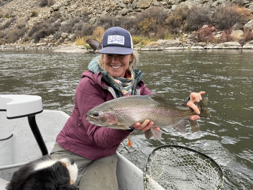 Angler with rainbow trout